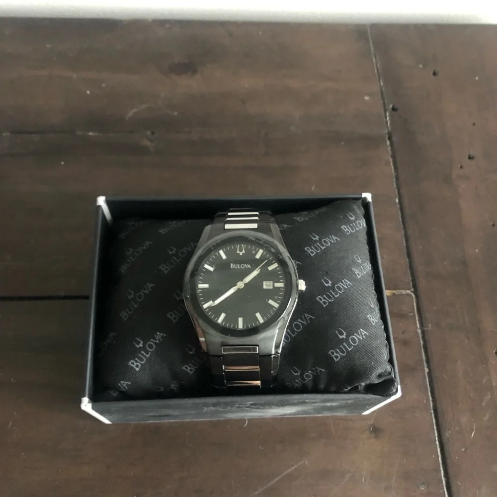 Bulova black watch.